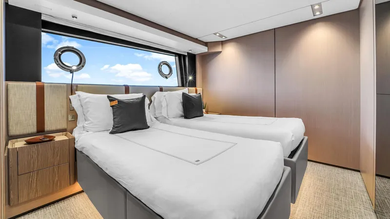 Aurora Yacht Photos Pics Luxurious twin bedroom on 2022 Ferretti Yachts 1000 with ocean view.
