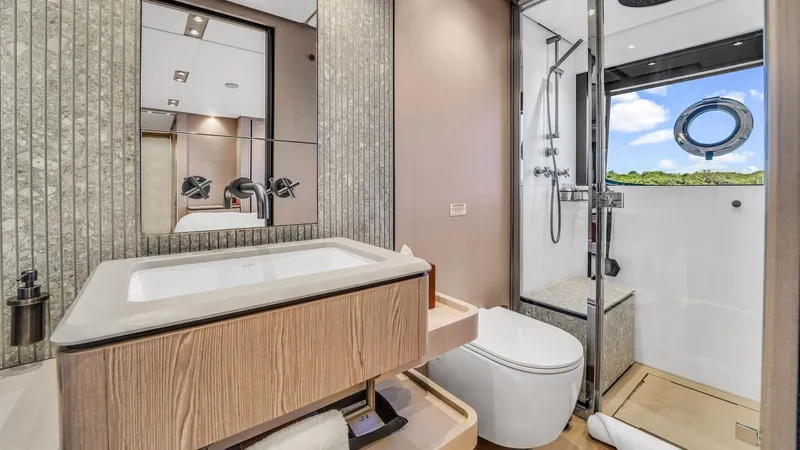 Aurora Yacht Photos Pics Luxurious bathroom in 2022 Ferretti Yachts 1000, featuring modern fixtures and elegant design.