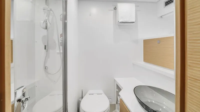 Aurora Yacht Photos Pics Luxurious bathroom in 2022 Ferretti Yachts 1000, featuring modern fixtures and elegant design.