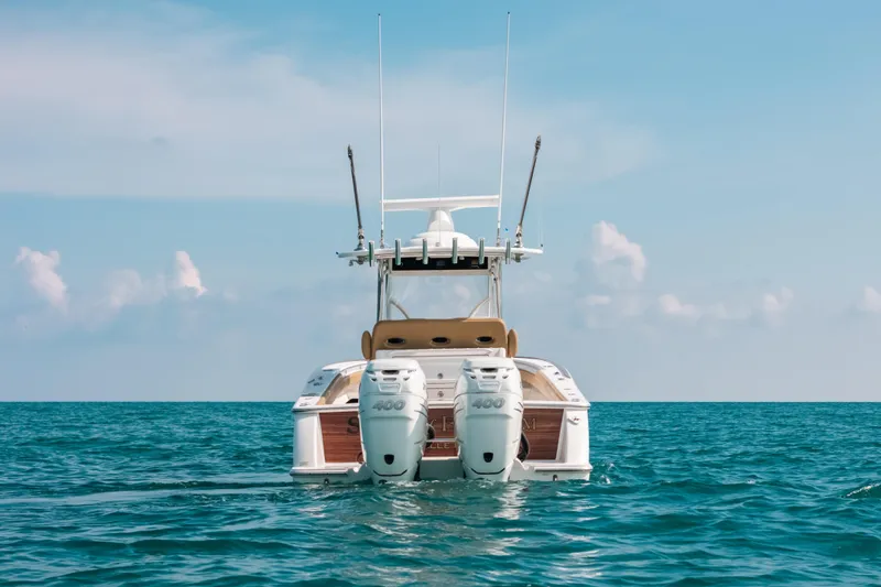  Yacht Photos Pics 2020 Valhalla Boatworks V-33 on open sea, rear view with dual engines.