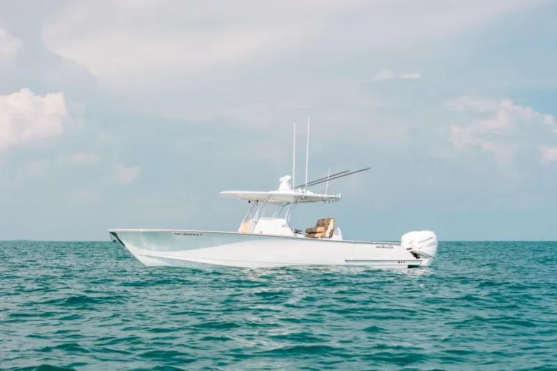  Yacht Photos Pics 2020 Valhalla Boatworks V-33 on open water under clear sky.