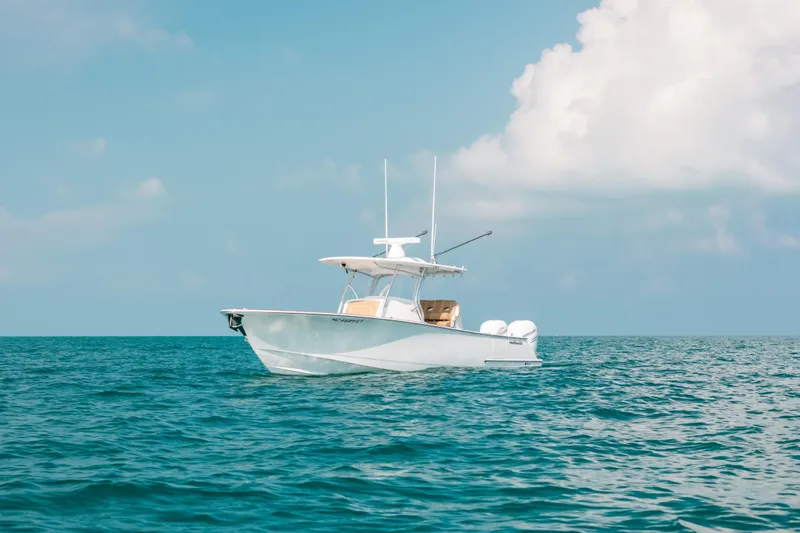  Yacht Photos Pics 2020 Valhalla Boatworks V-33 on calm ocean under blue sky.