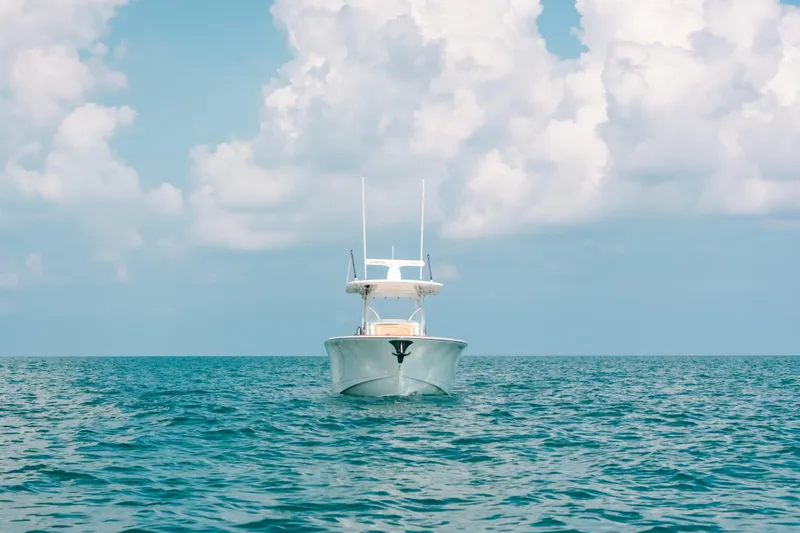  Yacht Photos Pics 2020 Valhalla Boatworks V-33 on open sea under cloudy sky.