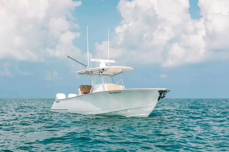  Yacht Photos Pics 2020 Valhalla Boatworks V-33 on open sea under cloudy sky.