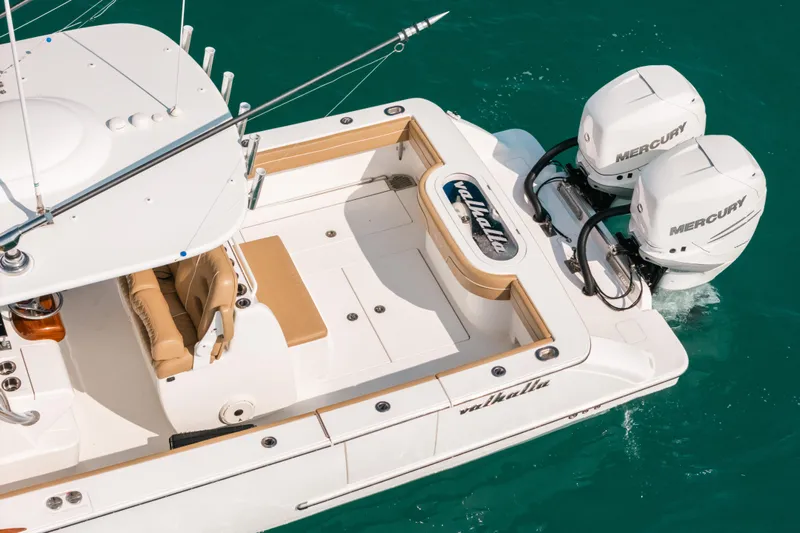  Yacht Photos Pics 2020 Valhalla Boatworks V-33 with twin Mercury engines on turquoise water.