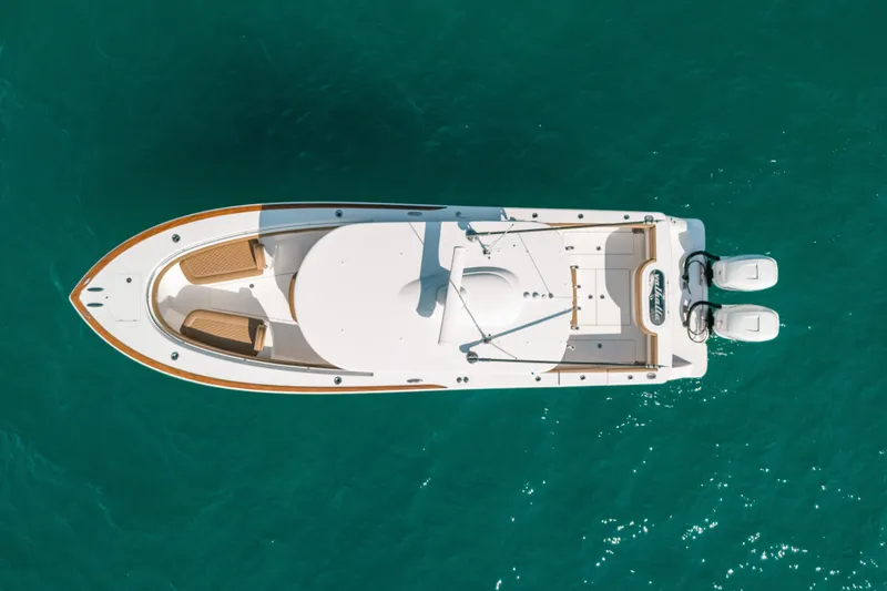 Yacht Photos Pics Aerial view of 2020 Valhalla Boatworks V-33 on turquoise water.