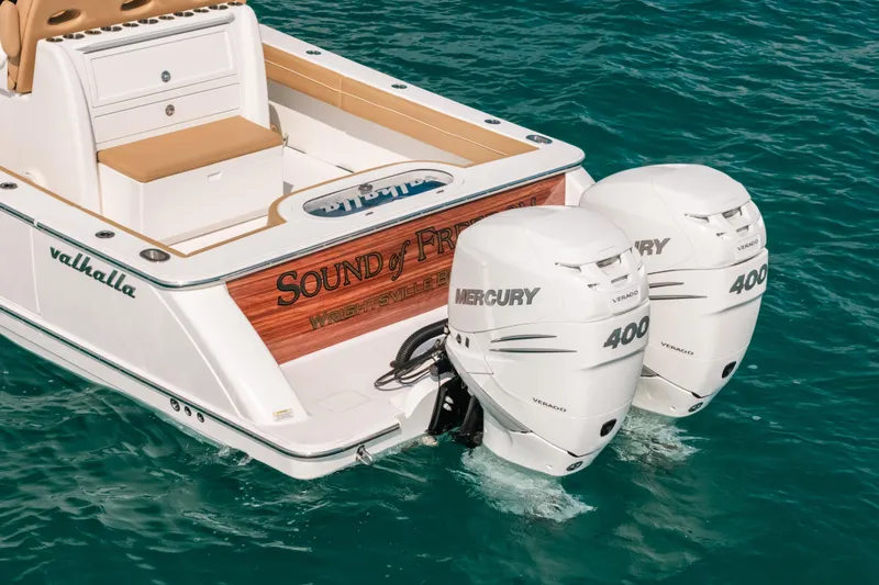  Yacht Photos Pics 2020 Valhalla V-33 boat with twin Mercury 400 engines on clear blue water.