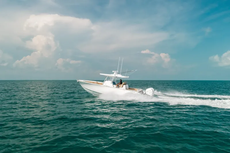  Yacht Photos Pics 2020 Valhalla Boatworks V-33 cruising on open ocean under clear skies.