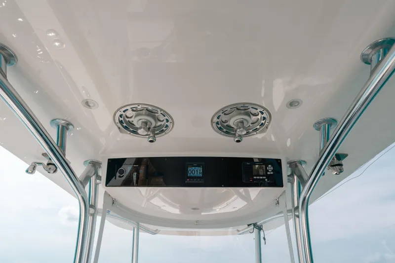  Yacht Photos Pics 2020 Valhalla Boatworks V-33 helm with modern controls and stainless steel fittings.