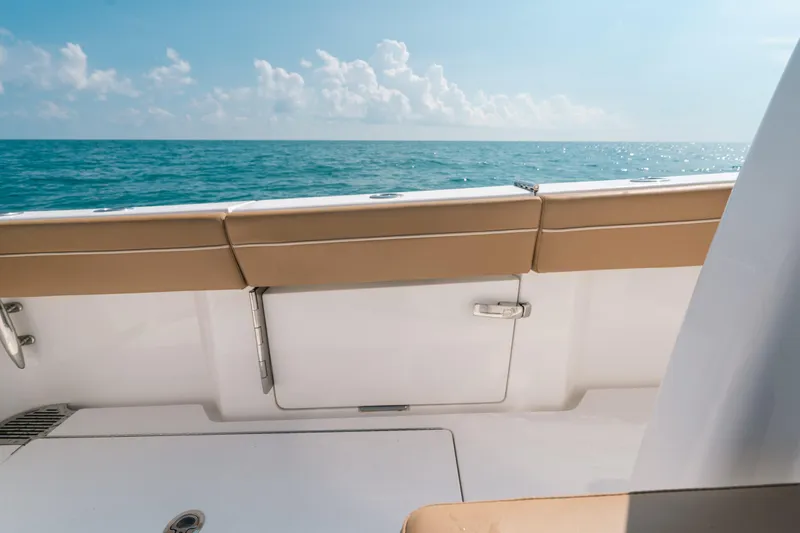  Yacht Photos Pics 2020 Valhalla Boatworks V-33 deck view with ocean backdrop.