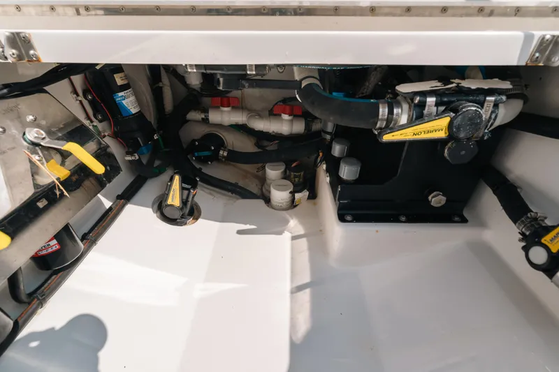  Yacht Photos Pics 2020 Valhalla Boatworks V-33 engine compartment with visible mechanical components and wiring.