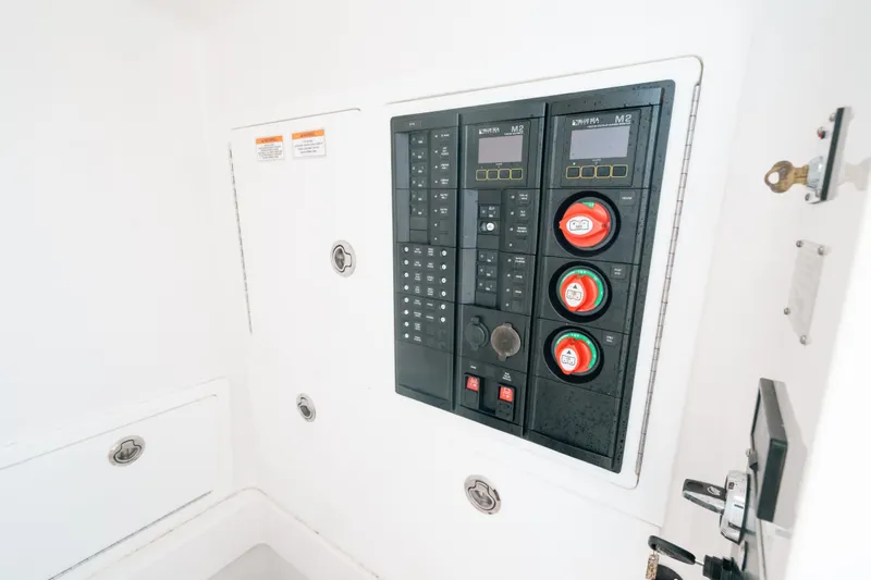  Yacht Photos Pics Electrical panel of 2020 Valhalla Boatworks V-33, featuring control switches and indicators.