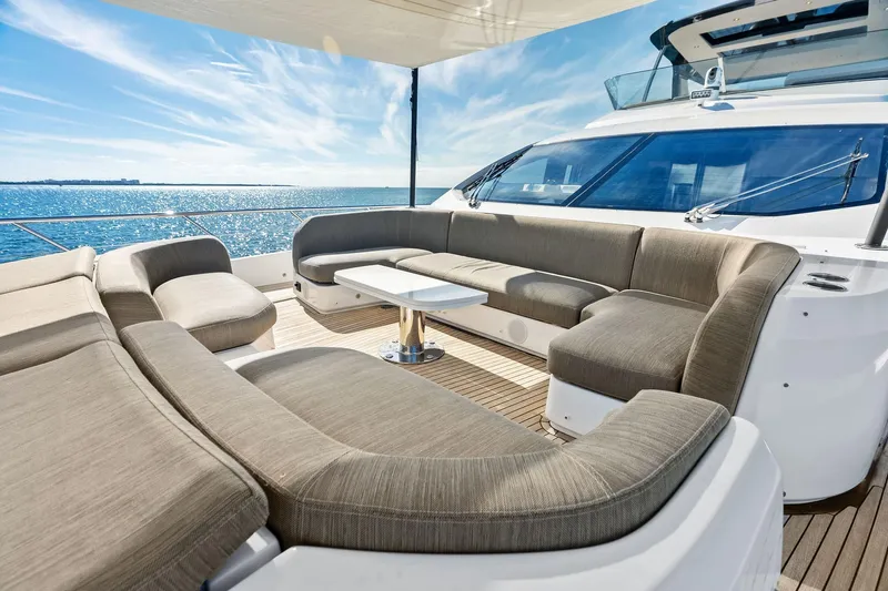  Yacht Photos Pics Luxurious 2021 Azimut Fly 78 yacht deck with elegant seating and ocean view.