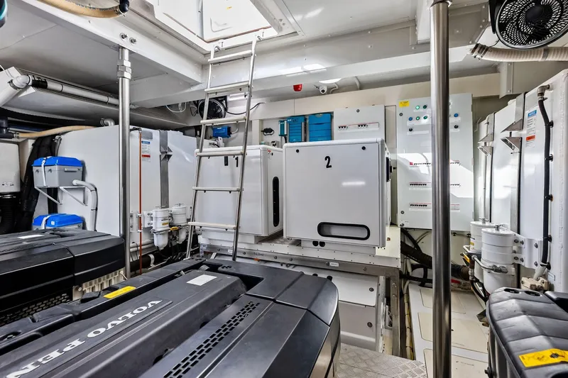  Yacht Photos Pics Engine room of 2021 Azimut Fly 78 yacht with Volvo Penta engines and control panels.