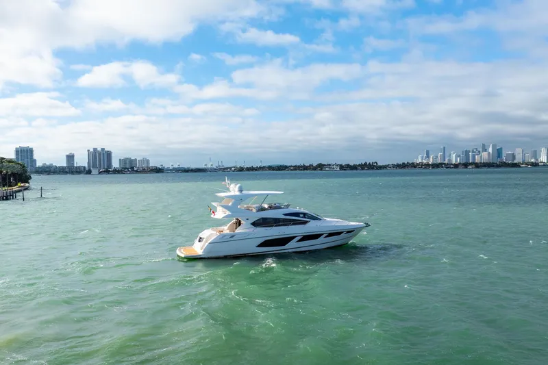  Yacht Photos Pics Sunseeker Manhattan 65 yacht cruising on a sunny day, 2016 model.