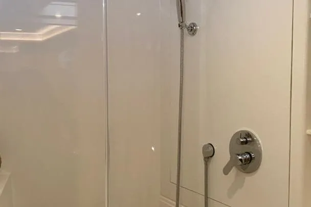  Yacht Photos Pics Modern shower area in 2023 Aquila 42 yacht bathroom.