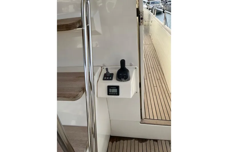 Odoo Id - 2.110 Yacht Photos Pics Beneteau Swift Trawler 50, 2021 model, featuring control panel and teak deck.