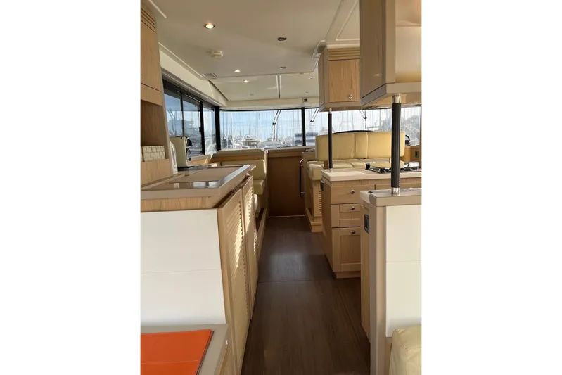 Odoo Id - 2.110 Yacht Photos Pics Interior of 2021 Beneteau Swift Trawler 50, featuring modern wood finishes and spacious layout.