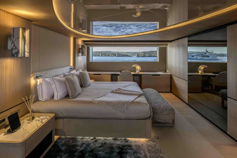 Unique S Yacht Photos Pics Luxurious 2024 Sanlorenzo SD118 yacht bedroom with elegant decor and ocean view.