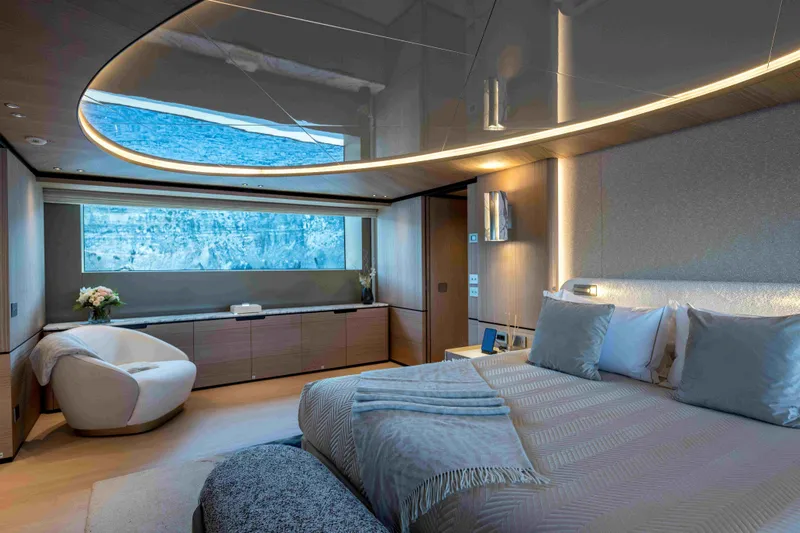 Unique S Yacht Photos Pics Luxurious bedroom interior of 2024 Sanlorenzo SD118 yacht with modern design and large window.