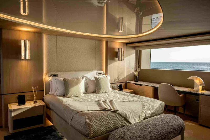 Unique S Yacht Photos Pics Luxurious bedroom interior of 2024 Sanlorenzo SD118 yacht with ocean view.