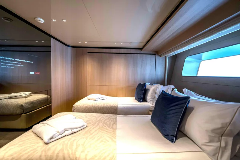 Unique S Yacht Photos Pics Luxurious twin bedroom on 2024 Sanlorenzo SD118 yacht with modern design and natural light.