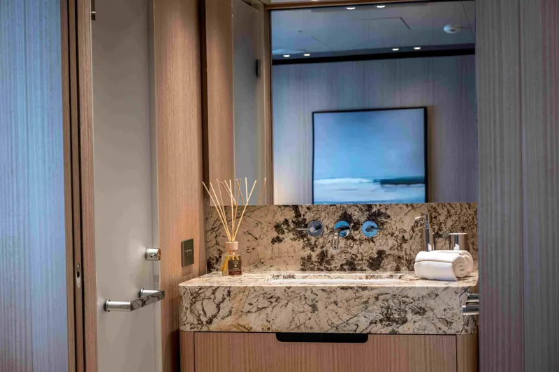 Unique S Yacht Photos Pics Luxurious bathroom on 2024 Sanlorenzo SD118 yacht with marble sink and modern decor.