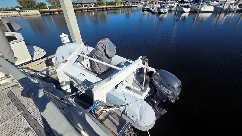 Cinsubar II Yacht Photos Pics Grand Banks 49 Classic 1997 with Yamaha outboard motor at dock.