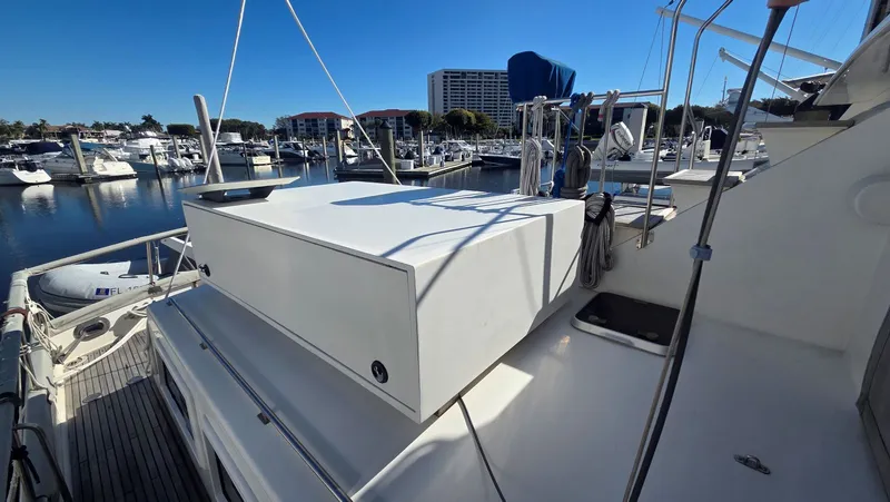 Cinsubar II Yacht Photos Pics Grand Banks 49 Classic 1997 at a sunny marina.