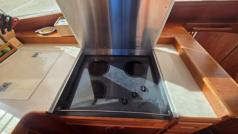 Cinsubar II Yacht Photos Pics Kitchen area on a 1997 Grand Banks 49 Classic yacht.