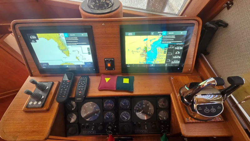 Cinsubar II Yacht Photos Pics Control console of the 1997 Grand Banks 49 Classic yacht.