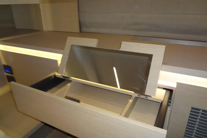 Dream Big Yacht Photos Pics 2023 Prestige 420S yacht interior with modern wooden cabinetry and built-in mirror.