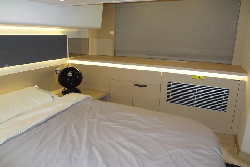 Dream Big Yacht Photos Pics Modern bedroom interior in 2023 Prestige 420S yacht, featuring sleek design and ambient lighting.
