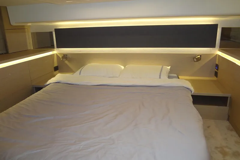 Dream Big Yacht Photos Pics Luxurious bedroom interior of 2023 Prestige 420S yacht with modern lighting.
