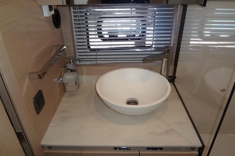 Dream Big Yacht Photos Pics Modern bathroom sink in 2023 Prestige 420S yacht, featuring sleek design and elegant fixtures.