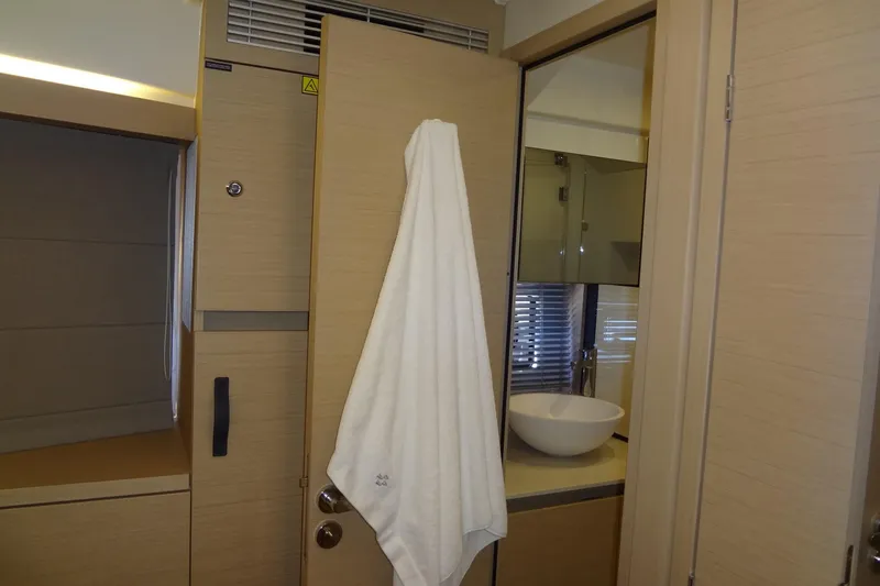 Dream Big Yacht Photos Pics Interior of 2023 Prestige 420S yacht bathroom with modern sink and towel.