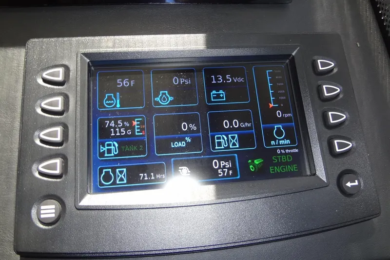 Dream Big Yacht Photos Pics Digital control panel of a 2023 Prestige 420S yacht displaying engine metrics.