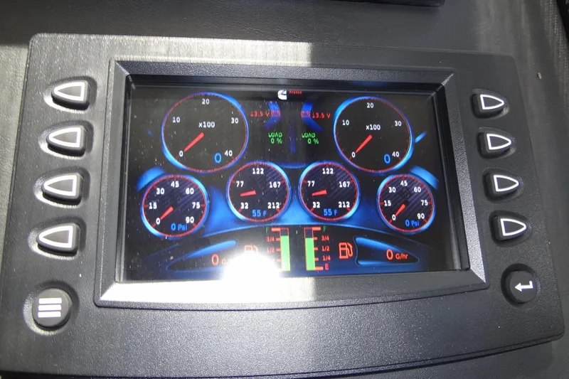 Dream Big Yacht Photos Pics Dashboard of 2023 Prestige 420S with digital gauges and control buttons.