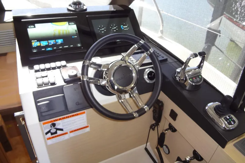 Dream Big Yacht Photos Pics 2023 Prestige 420S yacht helm with modern controls and navigation screens.