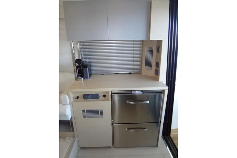 Dream Big Yacht Photos Pics Modern kitchen area in 2023 Prestige 420S yacht with stainless steel appliances.