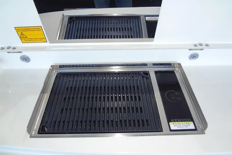 Dream Big Yacht Photos Pics Built-in Kenyon grill on 2023 Prestige 420S yacht, featuring sleek stainless steel design.