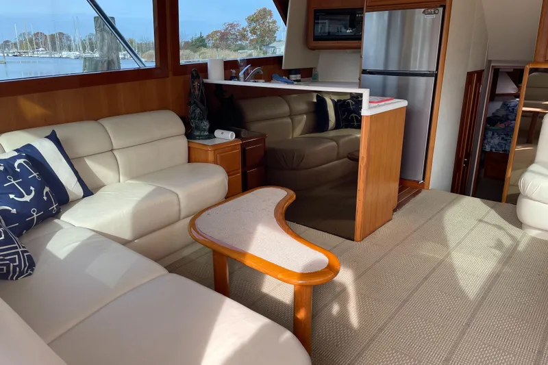 Tiramisu Yacht Photos Pics Luxurious interior of 1996 Viking 47 Convertible yacht with modern furnishings.