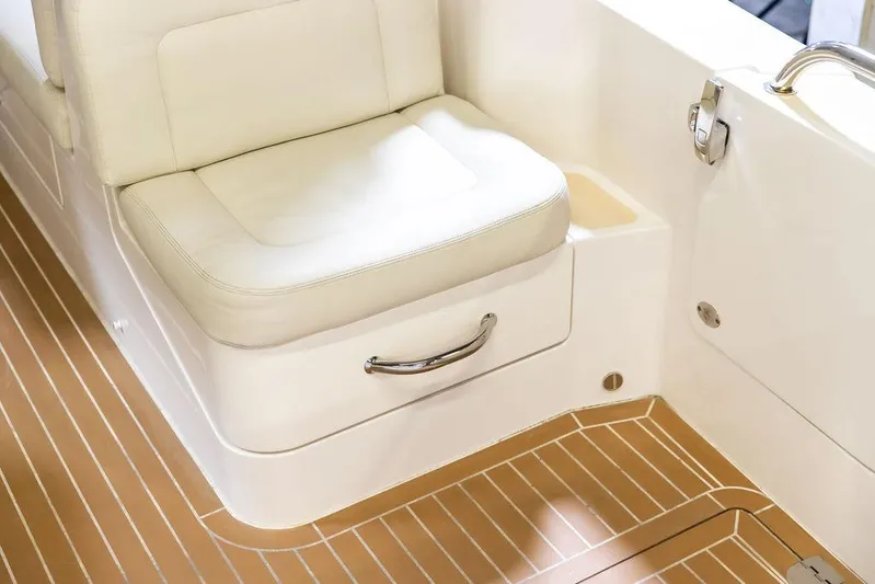 Mare Yacht Photos Pics 2018 MJM 35z boat interior with cushioned seating and teak-style flooring.