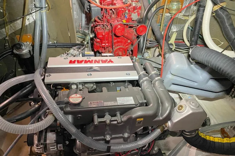 Challanger Yacht Photos Pics Engine room of a 1992 Hallberg-Rassy 45 yacht with Yanmar engine.