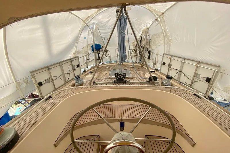 Challanger Yacht Photos Pics Interior view of 1992 Hallberg-Rassy 45 sailboat under protective cover.