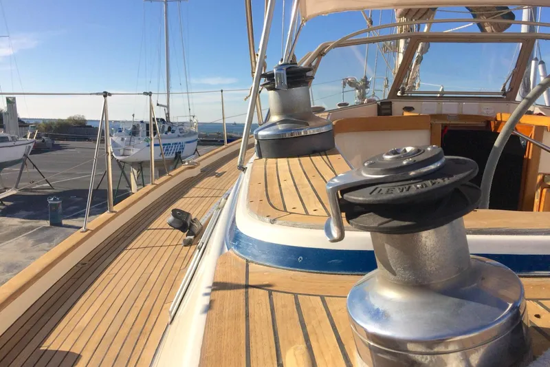 Challanger Yacht Photos Pics 1992 Hallberg-Rassy 45 yacht deck with winches and wooden finish.
