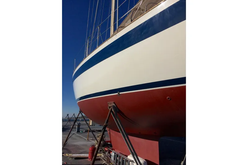 Challanger Yacht Photos Pics 1992 Hallberg-Rassy 45 sailboat on dry dock, showcasing hull and keel.