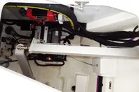 Engine compartment of a 2021 Leopard 50 yacht, showcasing mechanical components and wiring.