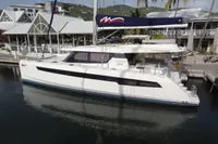 2021 Leopard 50 catamaran docked at marina, featuring sleek design and modern amenities.