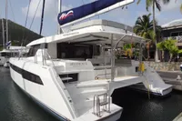 Luxury Leopard 50 catamaran yacht docked, 2021 model, featuring spacious deck and modern design.